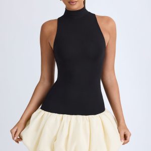 Turtleneck Drop-Waist Bubble Hem Mini Dress in Black