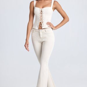 Petite Mid-Rise Flared Jeans in Ecru