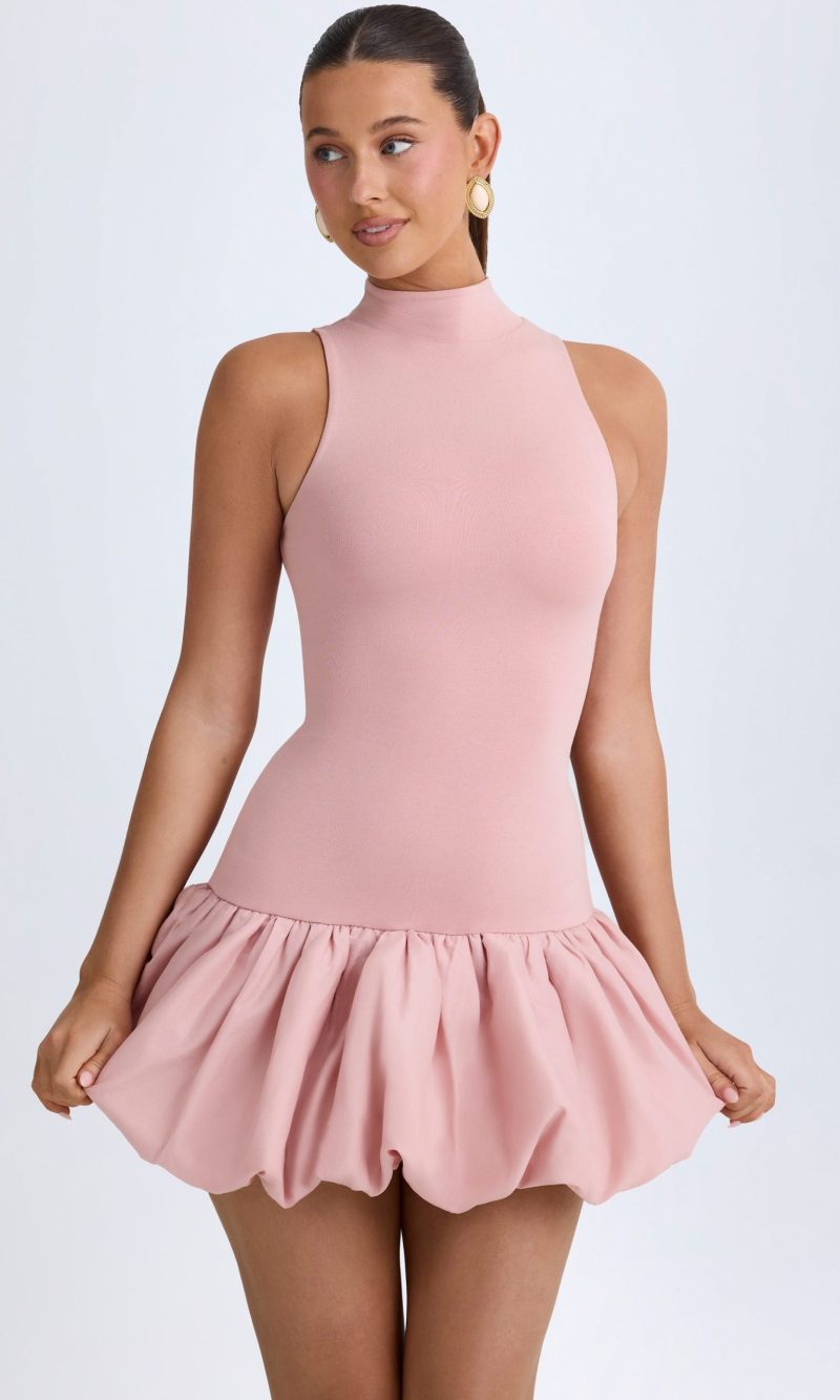 Turtleneck Drop-Waist Bubble Hem Mini Dress in Pink Mauve