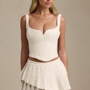 Layered Pleated Low-Rise Mini Skirt in Ivory