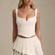 nada-layered-pleated-low-rise-mini-skirt-ivory_1_250416063351.jpg