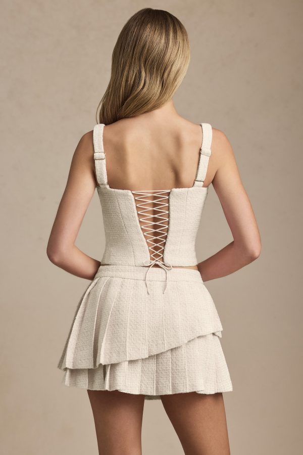 nada-layered-pleated-low-rise-mini-skirt-ivory_3_250416063351.jpg