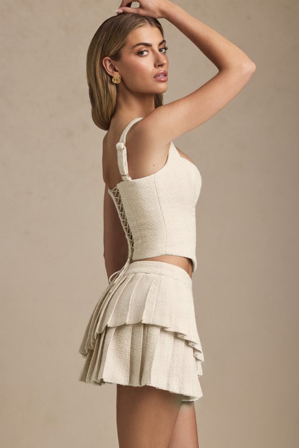 nada-layered-pleated-low-rise-mini-skirt-ivory_4_250416063351.jpg