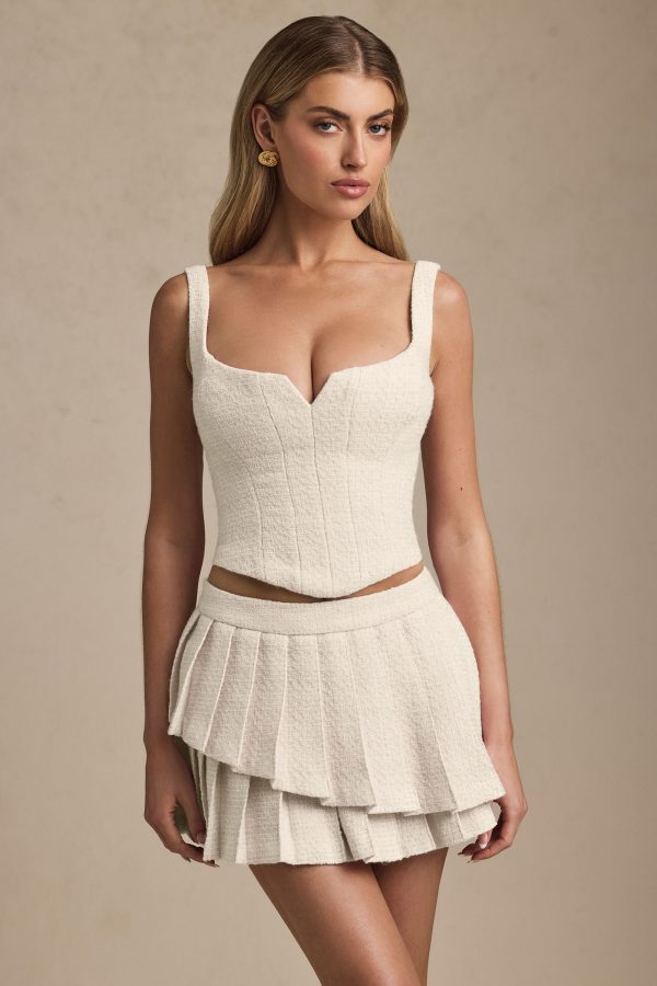 nada-layered-pleated-low-rise-mini-skirt-ivory_5_250416063351.jpg