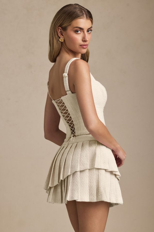 nada-layered-pleated-low-rise-mini-skirt-ivory_6_250416063351.jpg