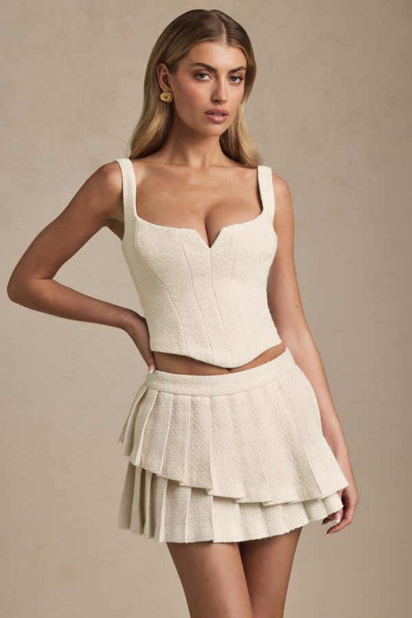 nada-layered-pleated-low-rise-mini-skirt-ivory_7_250416063351.jpg