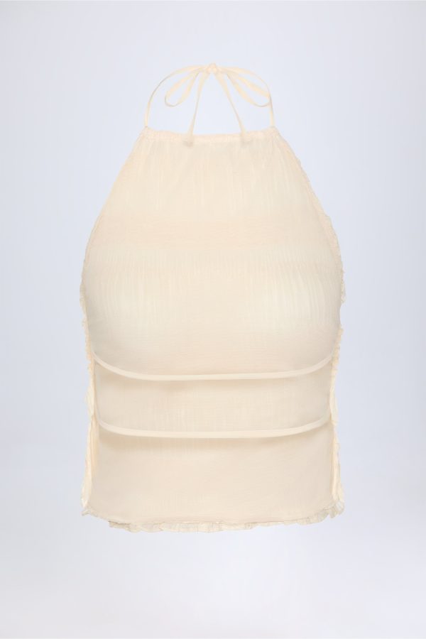 natesha-ruffled-high-neck-backless-top-ivory_7_250328035034.jpg