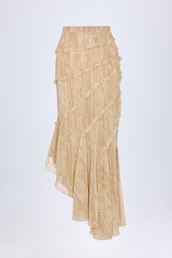 novina-ruffled-asymmetric-mid-rise-maxi-skirt-tan-print_1_250327063244.jpg