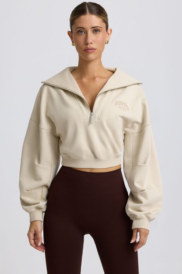 super-sculpt-comeback-season-quarter-zip-cropped-sweatshirt-bone_1_24123112112.jpg