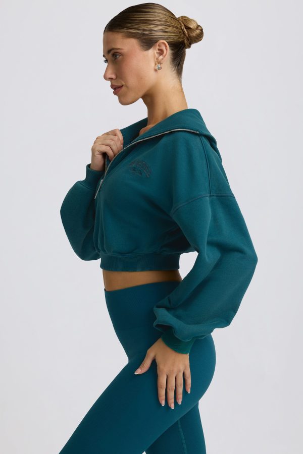 super-sculpt-comeback-season-quarter-zip-cropped-sweatshirt-teal_3_241231112544.jpg