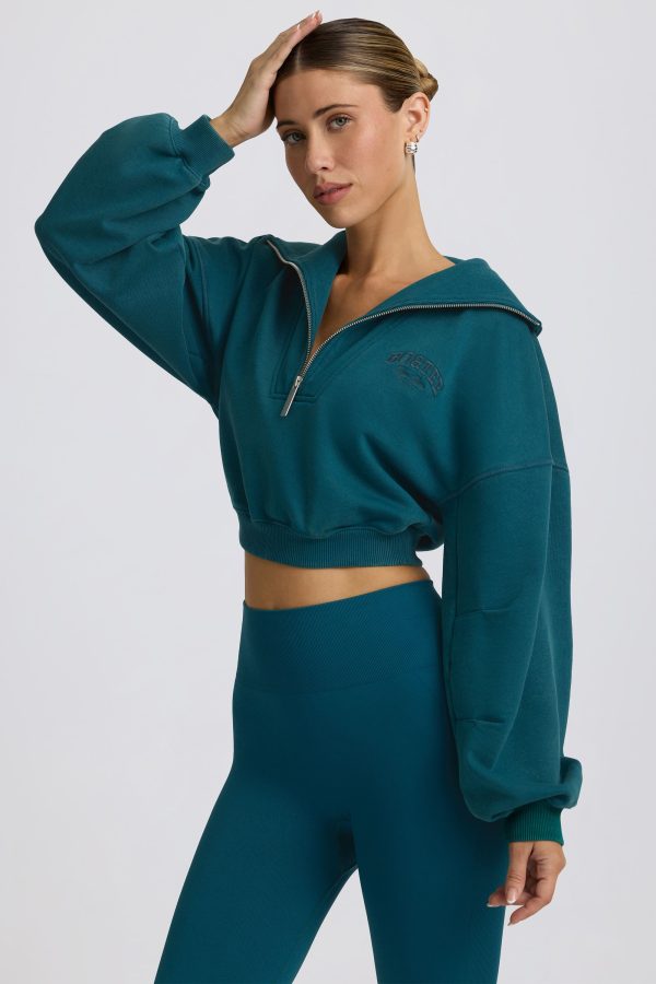super-sculpt-comeback-season-quarter-zip-cropped-sweatshirt-teal_5_241231112544.jpg