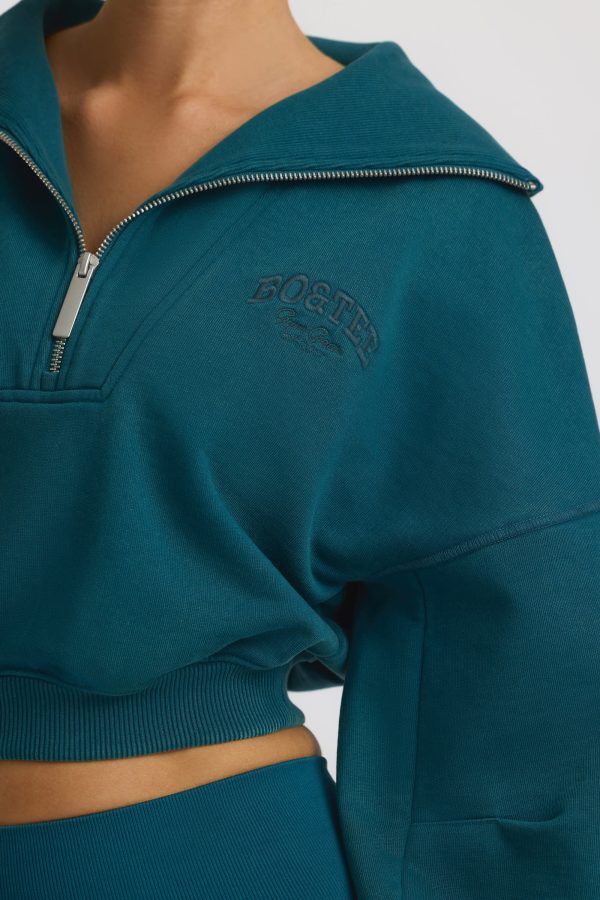super-sculpt-comeback-season-quarter-zip-cropped-sweatshirt-teal_6_241231112544.jpg