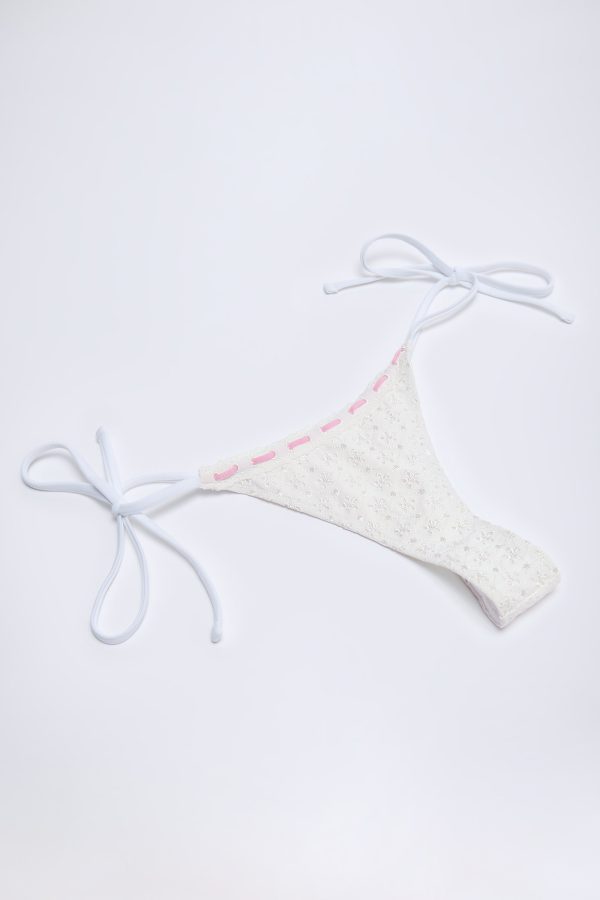 vernazza-broderie-anglaise-side-tie-thong-bikini-bottoms-white_4_250505060913.jpg